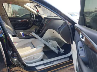 2015 Infiniti Q50 Premium with VIN JN1BV7AR6FM393586, listed as a IAAI auction lot 41683059 with 125,991 mi miles. Bid and sale history available at carsss.com. Image 5.