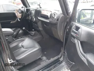2015 Jeep Wrangler Unlimited Rubicon Hard Rock with VIN 1C4HJWFG6FL757421, listed as a IAAI auction lot 42107514 with 63,997 mi miles and . Bid and sale history available at DreamBid. Image 5.