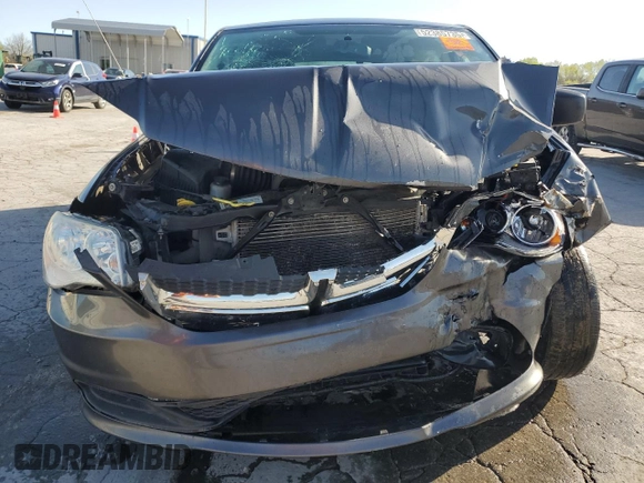 2015 Dodge Grand Caravan American Value with VIN 2C4RDGBG6FR603659, listed as a Copart auction lot 52385735 with 209,818 mi miles and Salvage Title. Bid and sale history available at DreamBid. Image 5.