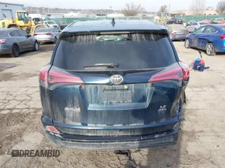 2018 Toyota RAV4 LE with VIN JTMBFREV5JD253342, listed as a IAAI auction lot 41656581 with 243,791 mi miles and . Bid and sale history available at DreamBid. Image 17.