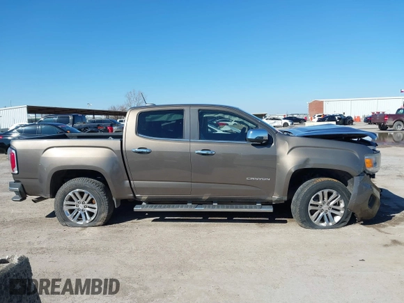 2015 GMC Canyon 2WD SLT with VIN 1GTG5CE32F1215628, listed as a IAAI auction lot 41412762 with 182,615 mi miles. Bid and sale history available at carsss.com. Image 13.