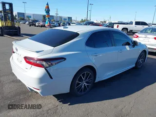 2023 Toyota Camry SE with VIN 4T1T11AK5PU117331, listed as a IAAI auction lot 41728043 with 13,019 mi miles and . Bid and sale history available at DreamBid. Image 4.