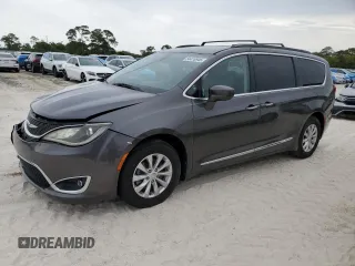 2017 Chrysler Pacifica Touring L z VIN 2C4RC1BG9HR569624, wystawiony jako Copart lot #54418945 z przebiegiem 128 381 mil mil oraz Szkoda całkowita • Salvage title. Historia ofert i sprzedaży dostępna na DreamBid. Obrazek 1.