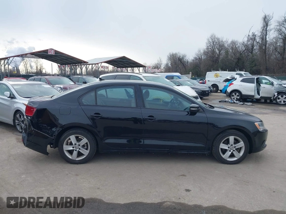 2012 Volkswagen Jetta TDI w/Premium with VIN 3VWLL7AJXCM073394, listed as a IAAI auction lot 41602574 with 159,668 mi miles and . Bid and sale history available at DreamBid. Image 13.