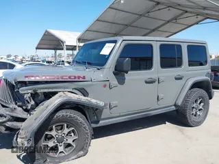 2019 Jeep Wrangler Unlimited Rubicon with VIN 1C4HJXFN6KW547401, listed as a IAAI auction lot 42250698 with 103,910 mi miles and . Bid and sale history available at DreamBid. Image 14.
