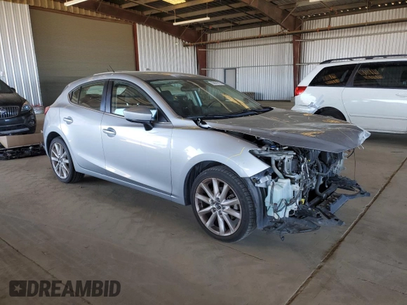 2017 Mazda 3 Touring with VIN 3MZBN1L79HM113024, listed as a Copart auction lot 55831015 with 102,267 mi miles and Salvage title. Bid and sale history available at DreamBid. Image 4.