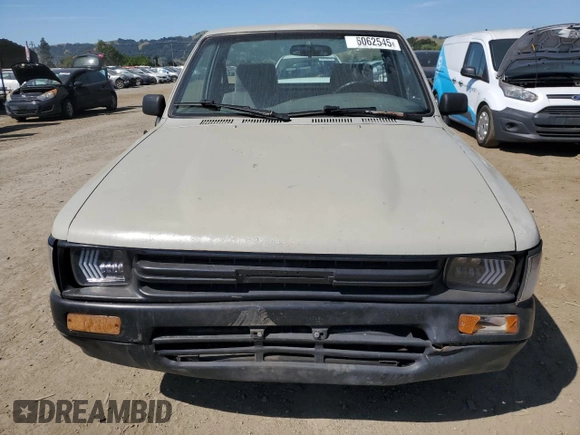 1992 Toyota Pickup z VIN JT4RN81A1N0094217, wystawiony jako Copart lot #56062545 z przebiegiem 242 256 mil mil oraz Szkoda całkowita • Salvage title. Historia ofert i sprzedaży dostępna na DreamBid. Obrazek 5.