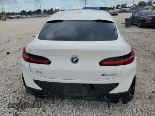 2024 BMW X4 M40i with VIN 5UX43DT02R9X54021, listed as a Copart auction lot 80482964 with 7,657 mi miles and Salvage Title. Bid and sale history available at carsss.com. Image 6.