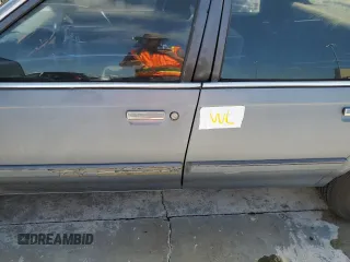 1996 Oldsmobile Cutlass Ciera 1SA VX5 z VIN 1G3AJ55M3T6326130, wystawiony jako Copart lot #73877264 z przebiegiem 74 073 mil mil oraz Szkody całkowita. Historia ofert i sprzedaży dostępna na DreamBid. Obrazek 12.
