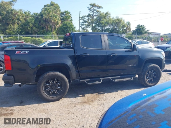 2020 Chevrolet Colorado 2WD Z71 z VIN 1GCGSDEN2L1122555, wystawiony jako IAAI lot #42096724 z przebiegiem 120 679 mil mil oraz . Historia ofert i sprzedaży dostępna na DreamBid. Obrazek 13.