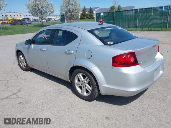 2012 Dodge Avenger SXT with VIN 1C3CDZCB4CN272422, listed as a IAAI auction lot 42122832 with 160,331 mi miles and . Bid and sale history available at carsss.com. Image 3.