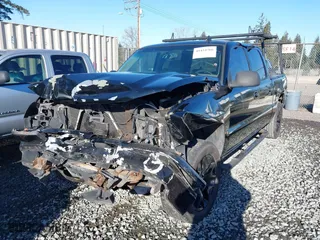 2006 Chevrolet Silverado 1500 LT1 with VIN 2GCEK13T061106215, listed as a IAAI auction lot 41434766 with 154,862 mi miles. Bid and sale history available at carsss.com. Image 2.