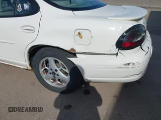 2003 Pontiac Grand Prix SE z VIN 1G2WK52J93F126127, wystawiony jako IAAI lot #42078346 z przebiegiem 236 183 mil mil oraz . Historia ofert i sprzedaży dostępna na DreamBid. Obrazek 17.