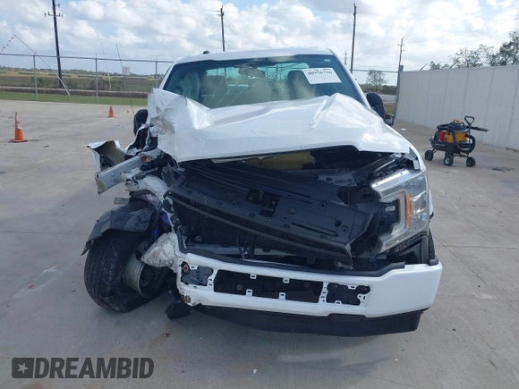 2018 Ford F-150 XL с VIN 1FTEX1C52JKF03033, выставлен на аукционе IAAI как лот 40956736 с пробегом Не указан миль и . История ставок и продаж доступна на DreamBid. Изображение 11.