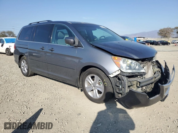 2010 Honda Odyssey Touring with VIN 5FNRL3H98AB053468, listed as a Copart auction lot 45524345 with 156,424 mi miles and Salvage Title. Bid and sale history available at carsss.com. Image 4.