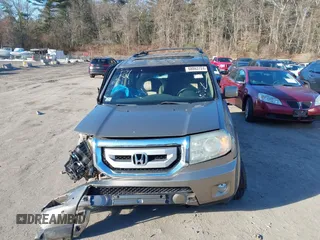 2011 Honda Pilot EX-L with VIN 5FNYF3H64BB030389, listed as a IAAI auction lot 41514251 with 100,666 mi miles and . Bid and sale history available at DreamBid. Image 13.