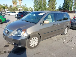 2010 Honda Odyssey LX with VIN 5FNRL3H2XAB030650, listed as a IAAI auction lot 42386287 with 146,161 mi miles and . Bid and sale history available at DreamBid. Image 2.