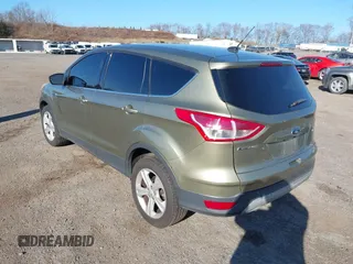 2013 Ford Escape SE with VIN 1FMCU0GX1DUA41932, listed as a IAAI auction lot 41896200 with 190,545 mi miles. Bid and sale history available at carsss.com. Image 3.