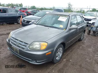 2004 Hyundai Accent GL z VIN KMHCG45C04U502892, wystawiony jako IAAI lot #42309078 z przebiegiem 127 362 mil mil oraz . Historia ofert i sprzedaży dostępna na DreamBid. Obrazek 2.