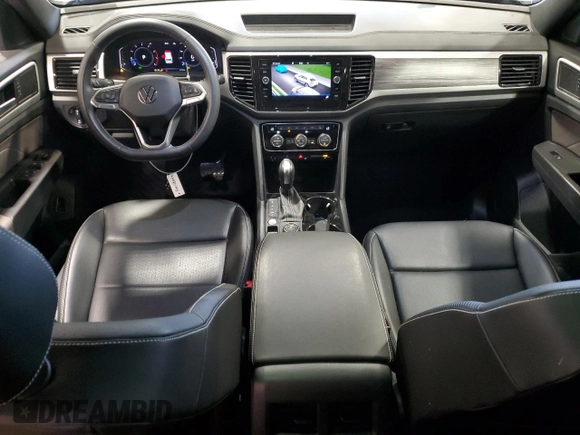 2023 Volkswagen Atlas SE with VIN 1V2KE2CA4PC212952, listed as a Copart auction lot 87014044 with 14,779 mi miles and Salvage title. Bid and sale history available at DreamBid. Image 8.