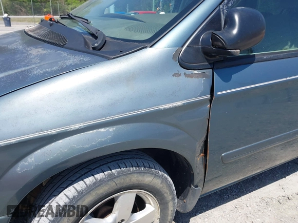 2005 Dodge Caravan SXT z VIN 2D4GP44L95R324232, wystawiony jako IAAI lot #42056320 z przebiegiem 200 459 mil mil oraz . Historia ofert i sprzedaży dostępna na DreamBid. Obrazek 6.