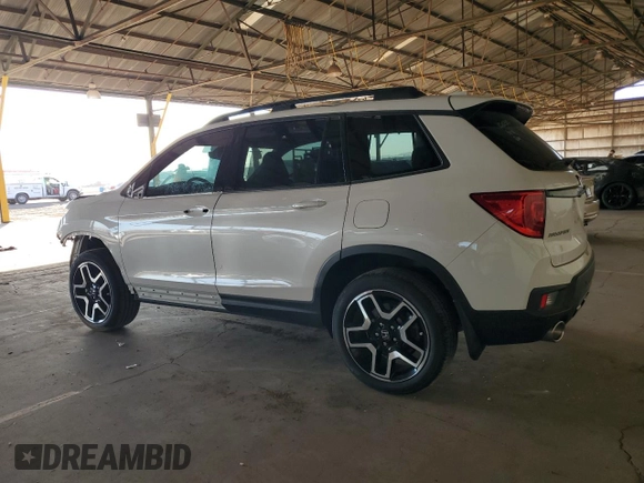 2023 Honda Passport Elite with VIN 5FNYF8H06PB032502, listed as a Copart auction lot 75814814 with 13,070 mi miles and Salvage Title. Bid and sale history available at carsss.com. Image 2.