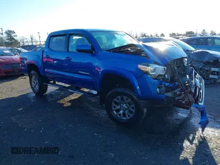 2018 Toyota Tacoma SR with VIN 3TMCZ5AN3JM138480, listed as a IAAI auction lot 41080910 with 99,225 mi miles. Bid and sale history available at carsss.com. Image 1.
