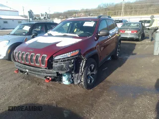 2014 Jeep Cherokee Trailhawk with VIN 1C4PJMBS9EW161047, listed as a IAAI auction lot 41841038 with Not Provided miles. Bid and sale history available at carsss.com. Image 17.