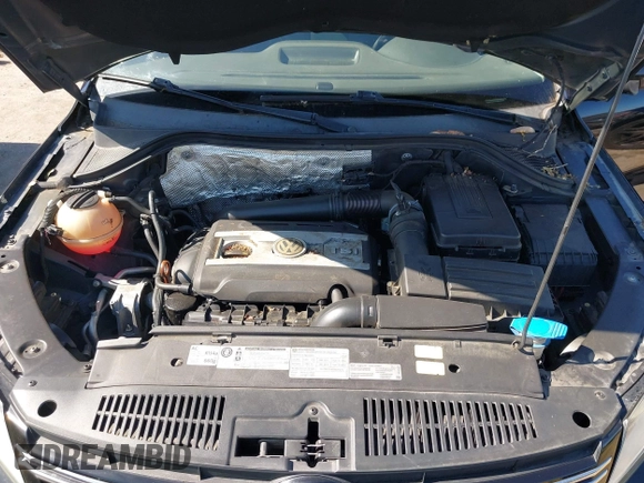 2012 Volkswagen Tiguan LE with VIN WVGAV7AX1CW557250, listed as a IAAI auction lot 42300694 with 122,310 mi miles and . Bid and sale history available at DreamBid. Image 10.
