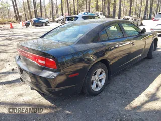 2014 Dodge Charger SE with VIN 2C3CDXBG3EH129796, listed as a IAAI auction lot 41773595 with 172,990 mi miles and . Bid and sale history available at DreamBid. Image 4.