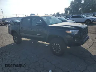 2022 Toyota Tacoma SR with VIN 3TMCZ5AN0NM475548, listed as a Copart auction lot 42057405 with 56,008 mi miles and Salvage title. Bid and sale history available at DreamBid. Image 4.