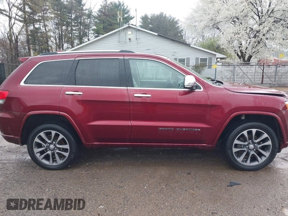 2017 Jeep Grand Cherokee Overland with VIN 1C4RJFCG5HC854024, listed as a IAAI auction lot 42006307 with 118,640 mi miles. Bid and sale history available at carsss.com. Image 14.