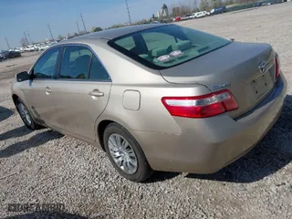 2007 Toyota Camry CE with VIN 4T1BE46K57U082347, listed as a IAAI auction lot 42004676 with 107,000 mi miles. Bid and sale history available at carsss.com. Image 3.