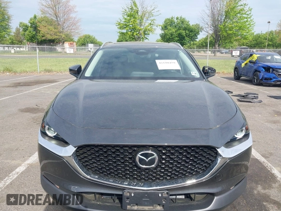 2024 Mazda CX-30 S Carbon Edition with VIN 3MVDMBCM5RM665341, listed as a IAAI auction lot 42180459 with 4,496 mi miles and . Bid and sale history available at DreamBid. Image 12.