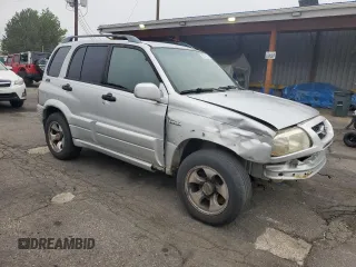 1999 Suzuki Grand Vitara JLX z VIN JS3TD62V9X4123460, wystawiony jako Copart lot #58574925 z przebiegiem 260 368 mil mil oraz Szkoda całkowita • Salvage title. Historia ofert i sprzedaży dostępna na DreamBid. Obrazek 4.