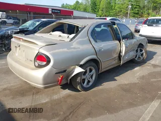 2000 Nissan Maxima GXE with VIN JN1CA31D4YT556029, listed as a IAAI auction lot 42160508 with 227,696 mi miles and . Bid and sale history available at DreamBid. Image 4.