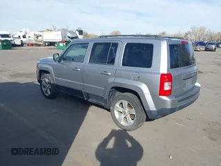 2016 Jeep Patriot High Altitude Edition with VIN 1C4NJRFB1GD712715, listed as a IAAI auction lot 41984245 with 124,227 mi miles. Bid and sale history available at carsss.com. Image 3.