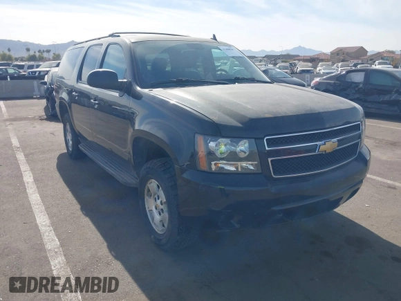 2013 Chevrolet Suburban LS with VIN 1GNSKHE71DR332335, listed as a IAAI auction lot 41408949 with 167,860 mi miles. Bid and sale history available at carsss.com. Image 1.