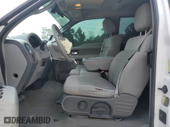 2005 Ford F-150 STX with VIN 1FTRX14W35FB76018, listed as a Copart auction lot 54075785 with 209,176 mi miles and Salvage Title. Bid and sale history available at carsss.com. Image 7.