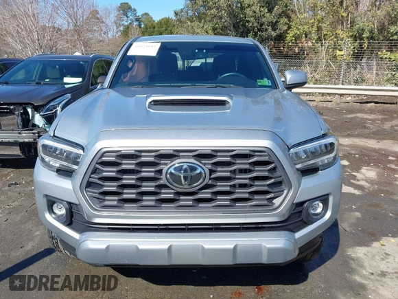 2023 Toyota Tacoma 4WD SR with VIN 3TYCZ5AN7PT122067, listed as a IAAI auction lot 41624047 with 27,483 mi miles. Bid and sale history available at carsss.com. Image 12.