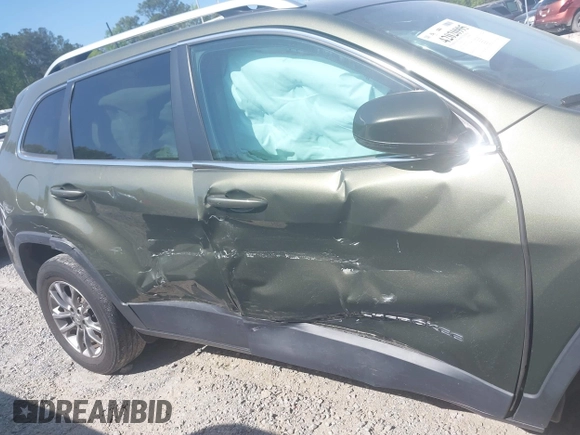 2019 Jeep Cherokee Latitude Plus with VIN 1C4PJMLB4KD418282, listed as a IAAI auction lot 42020995 with 58,000 mi miles and . Bid and sale history available at DreamBid. Image 6.