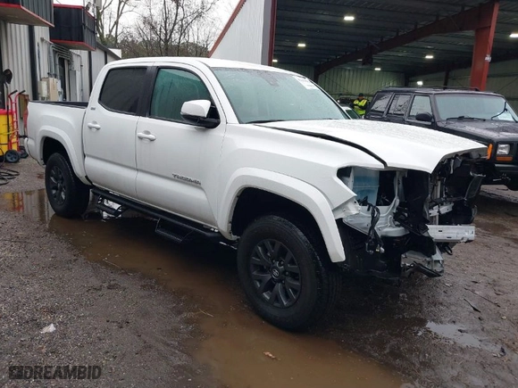 2023 Toyota Tacoma 4WD SR with VIN 3TMCZ5AN6PM633698, listed as a IAAI auction lot 41443892 with 13,214 mi miles. Bid and sale history available at carsss.com. Image 1.