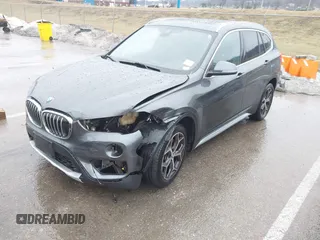 2019 BMW X1 sDrive28i with VIN WBXHU7C52K5L12160, listed as a IAAI auction lot 41452244 with 59,344 mi miles and . Bid and sale history available at DreamBid. Image 19.