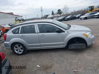 2011 Dodge Caliber Mainstreet with VIN 1B3CB3HA2BD238032, listed as a IAAI auction lot 41865918 with 98,022 mi miles and . Bid and sale history available at DreamBid. Image 13.