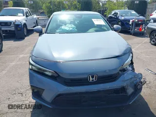2023 Honda Civic Touring with VIN 2HGFE1F92PH322377, listed as a IAAI auction lot 42361473 with 43,533 mi miles and . Bid and sale history available at DreamBid. Image 11.