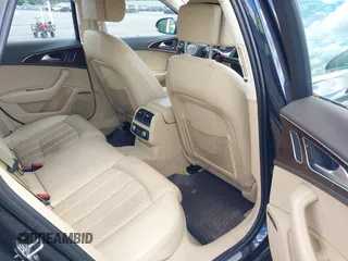 2013 Audi A6 Prestige z VIN WAUJGAFC6DN005023, wystawiony jako IAAI lot #42201985 z przebiegiem 80 337 mil mil oraz . Historia ofert i sprzedaży dostępna na DreamBid. Obrazek 8.