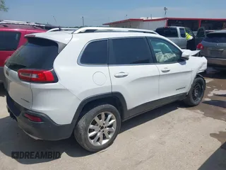 2015 Jeep Cherokee Limited with VIN 1C4PJLDS8FW566065, listed as a IAAI auction lot 42032563 with 181,937 mi miles and . Bid and sale history available at DreamBid. Image 4.