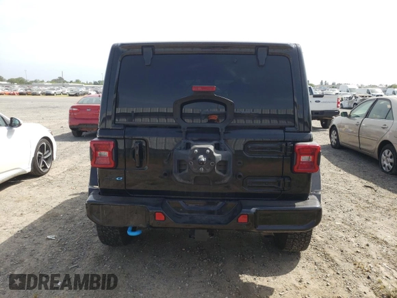 2022 Jeep Wrangler Unlimited Sahara with VIN 1C4JJXP60NW172991, listed as a Copart auction lot 54272305 with 54,361 mi miles and Salvage title. Bid and sale history available at DreamBid. Image 6.