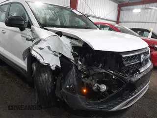 2023 Volkswagen Taos S z VIN 3VVCX7B22PM307548, wystawiony jako IAAI lot #42139747 z przebiegiem 34 299 mil mil oraz . Historia ofert i sprzedaży dostępna na DreamBid. Obrazek 6.