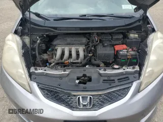 2009 Honda Fit Sport with VIN JHMGE88469S064405, listed as a Copart auction lot 61413745 with 179,497 mi miles and Salvage title. Bid and sale history available at DreamBid. Image 11.